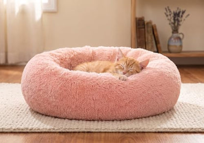 SAVFOX 20 inches Calming Donut Dog Bed - 3X Durable Plush Faux Fur, Machine Washable & Non-Slip, Fits up to 15 lbs, Pink