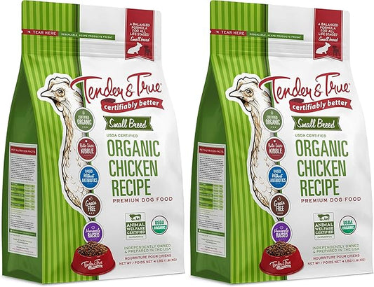 Two packages of Tender & True organic chicken recipe dog food on a white background